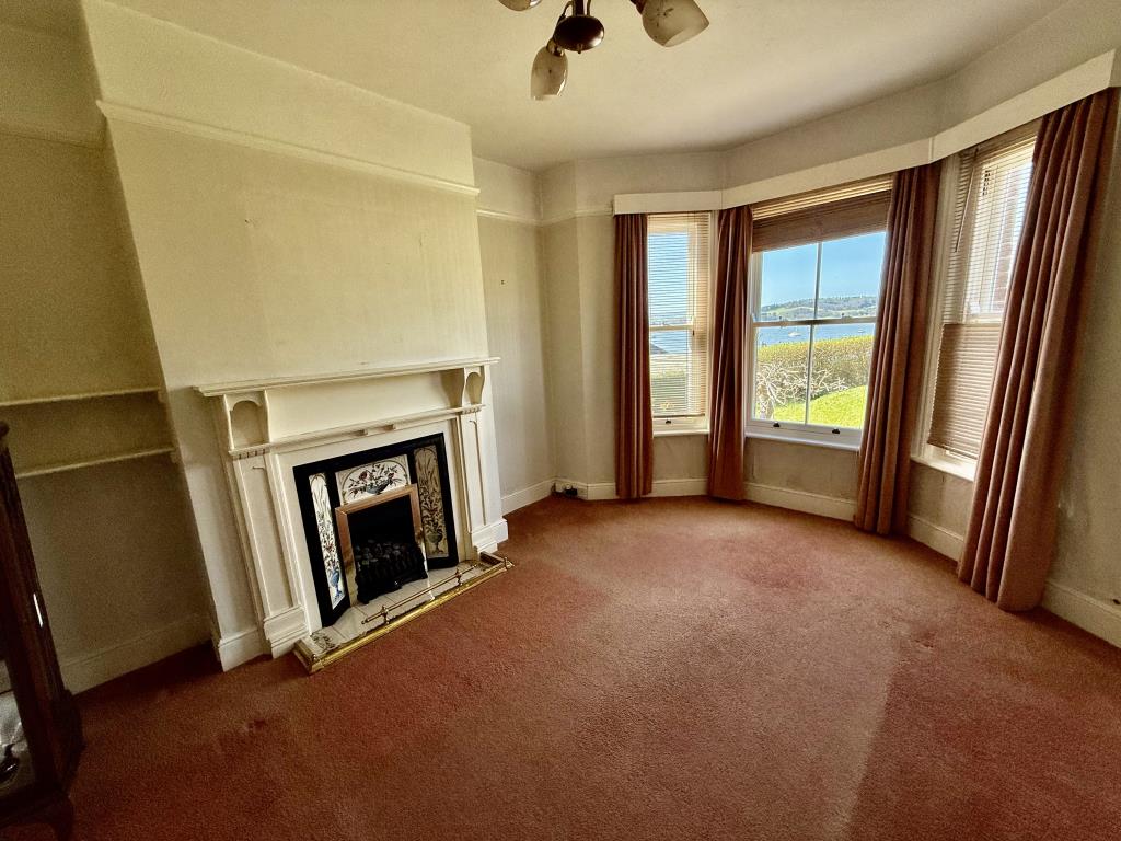 Lot: 153 - SEMI-DETACHED PROPERTY WITH SPECTACULAR WATERSIDE VIEWS, FOR REPAIR AND REFURBISHMENT - Living room showing views